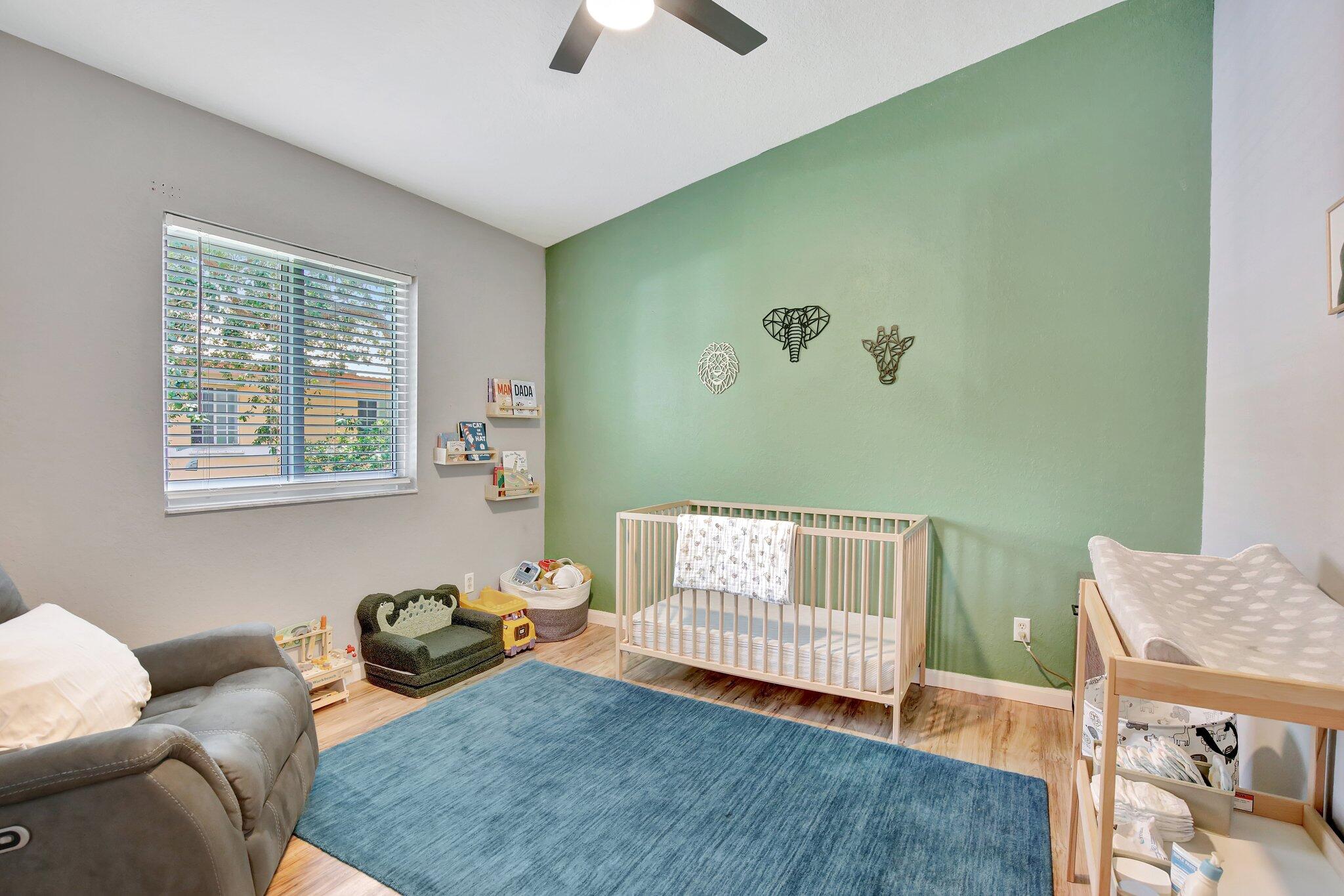 8730 Southwest 21st Street Miramar, FL 33025 - Photo 15 of 45 a bedroom with furniture and a window