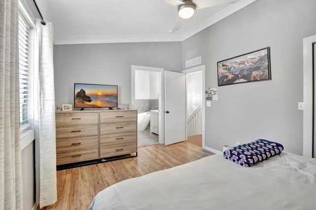 a bedroom with a bed and furniture