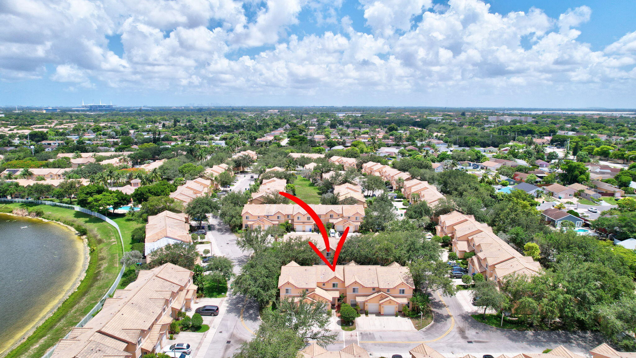 8730 Southwest 21st Street Miramar, FL 33025 - Photo 33 of 45 an aerial view of residential building and car parked