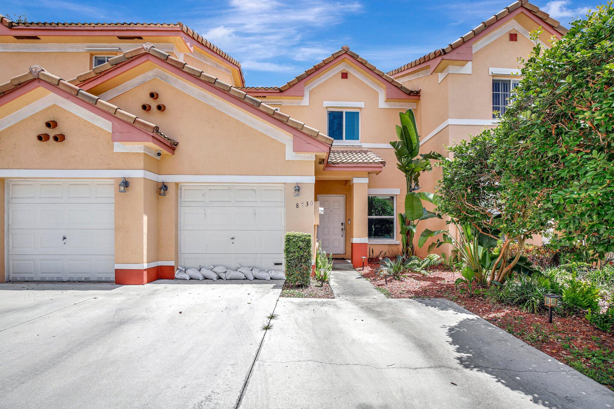 8730 Southwest 21st Street Miramar, FL 33025 - Photo 44 of 45 a view of a house with a yard