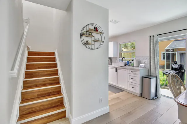 a view of dining room and wooden floor