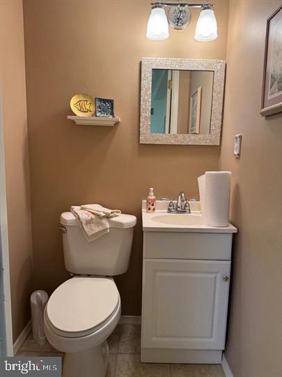 10201-00 Bustleton Avenue, Unit A1 Philadelphia, PA 19116 - Photo 11 of 16 a bathroom with a toilet sink and mirror
