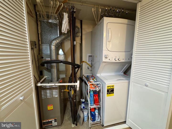 10201-00 Bustleton Avenue, Unit A1 Philadelphia, PA 19116 - Photo 12 of 16 a utility room with dryer and washer