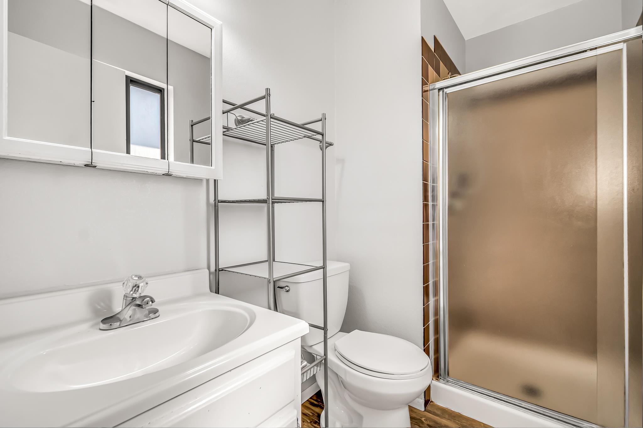486 Harris Road Grand Junction, CO 81501 - Photo 10 of 15 a bathroom with a sink toilet and shower