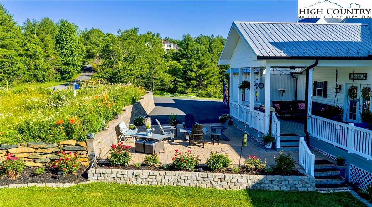 461 Chestnut Ridge Drive Jefferson, NC 28640 - Photo 44 of 47 front view of a house with a yard