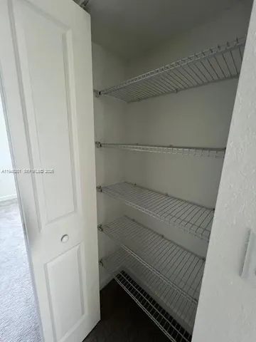 a view of storage and utility room