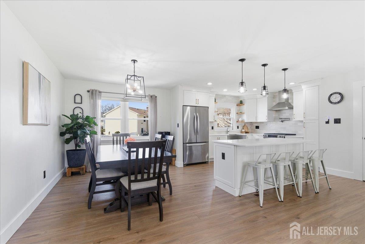 83 Garfield Avenue Colonia, NJ 07067 - Photo 13 of 45 a view of a dining room with furniture