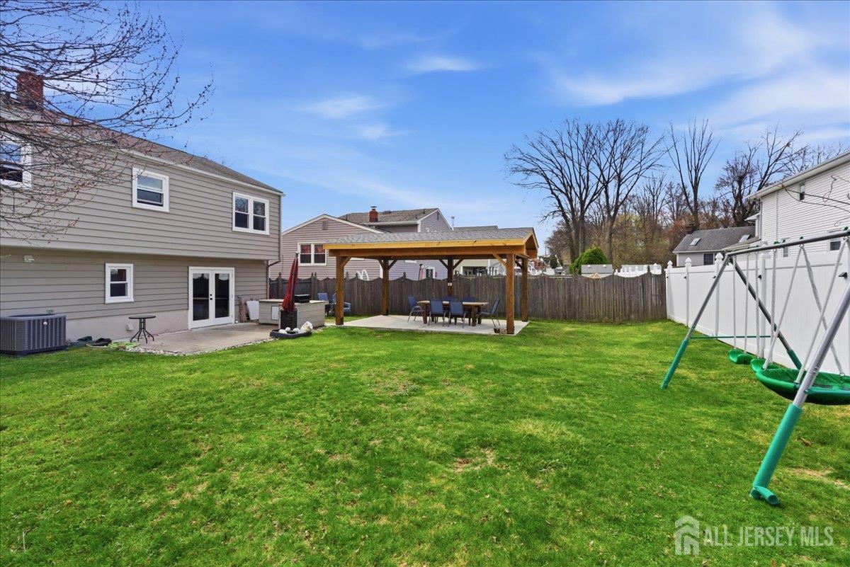 83 Garfield Avenue Colonia, NJ 07067 - Photo 34 of 45 a view of a house with a backyard