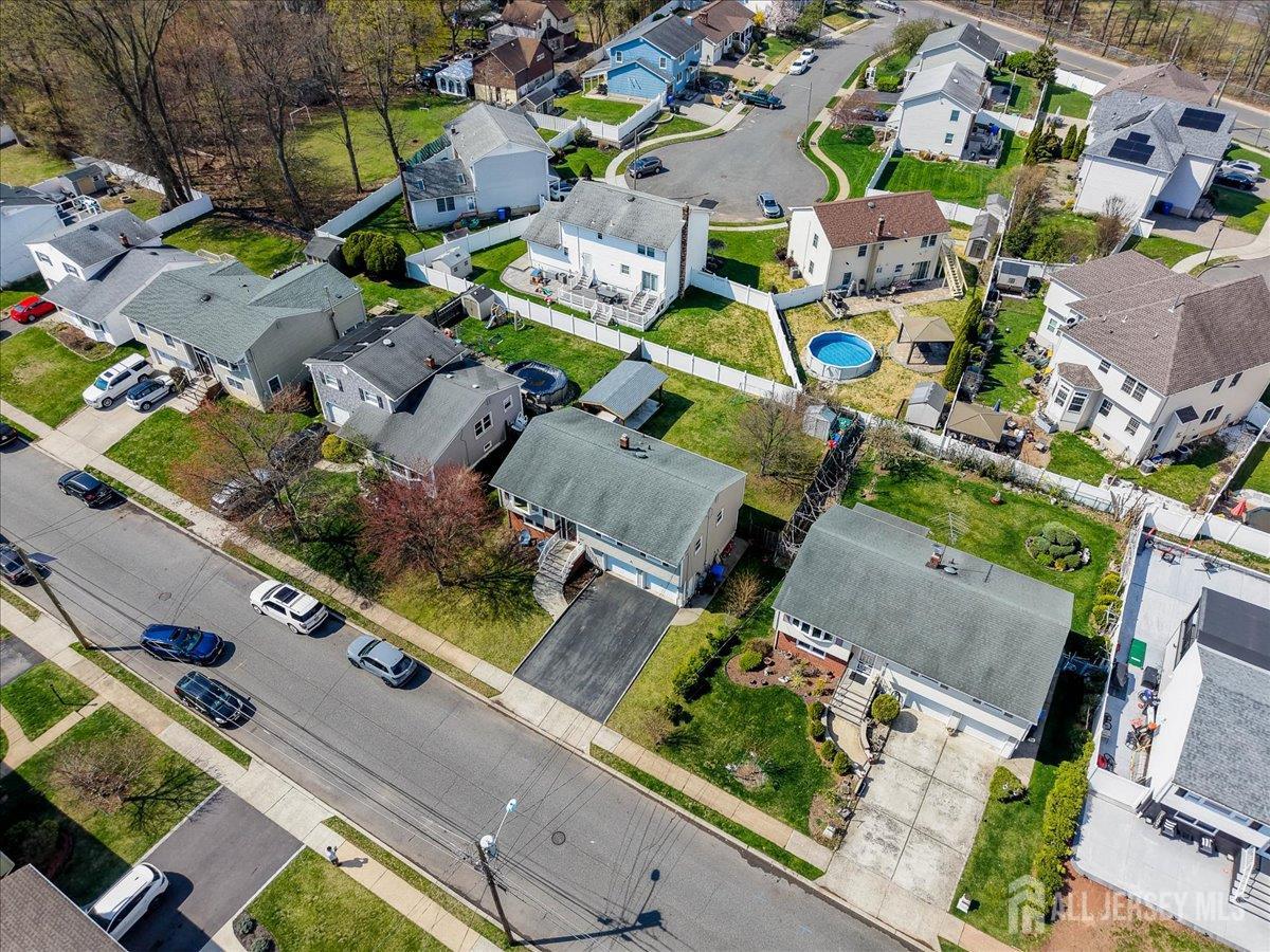 83 Garfield Avenue Colonia, NJ 07067 - Photo 42 of 45 an aerial view of residential houses with outdoor space