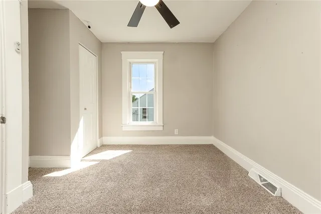 an empty room with windows