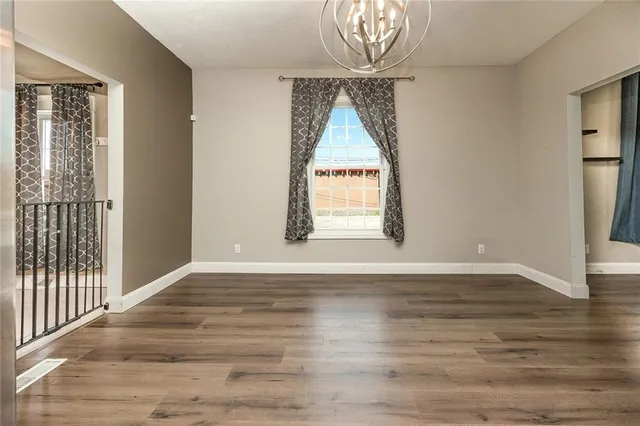 a view of a livingroom with wooden floor