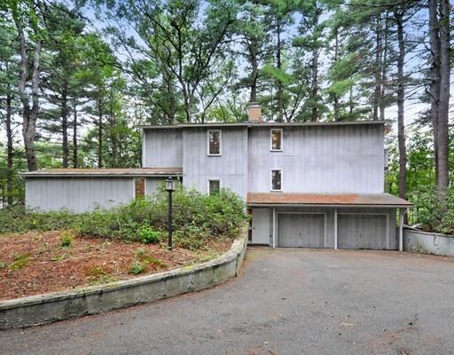 52 Temple Road Concord, MA 01742 - Photo 1 of 13 a view of a house with a yard and a large tree