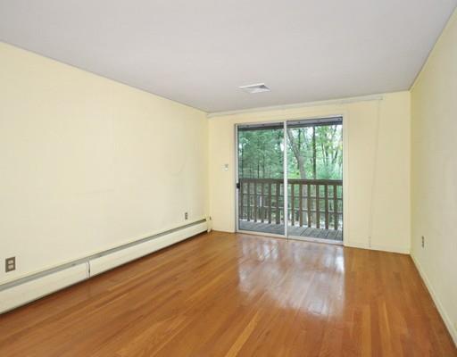 52 Temple Road Concord, MA 01742 - Photo 11 of 13 a view of an empty room with wooden floor and a window