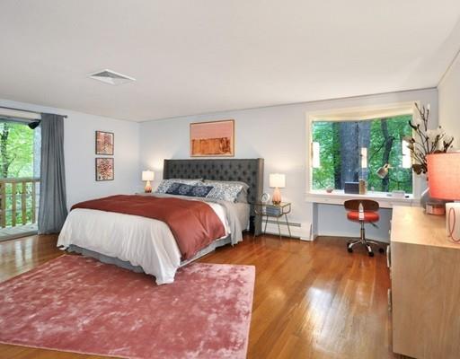 52 Temple Road Concord, MA 01742 - Photo 6 of 13 a spacious bedroom with a bed and a large window