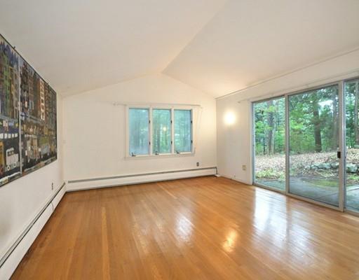 52 Temple Road Concord, MA 01742 - Photo 9 of 13 a view of an empty room with wooden floor and a window