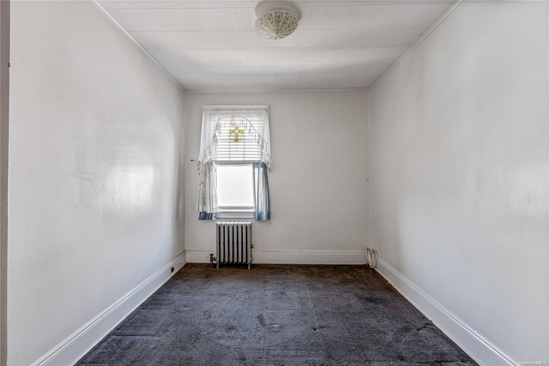 77-40 74th Street Queens, NY 11385 - Photo 7 of 28