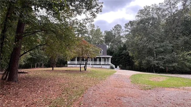 a view of backyard with green space
