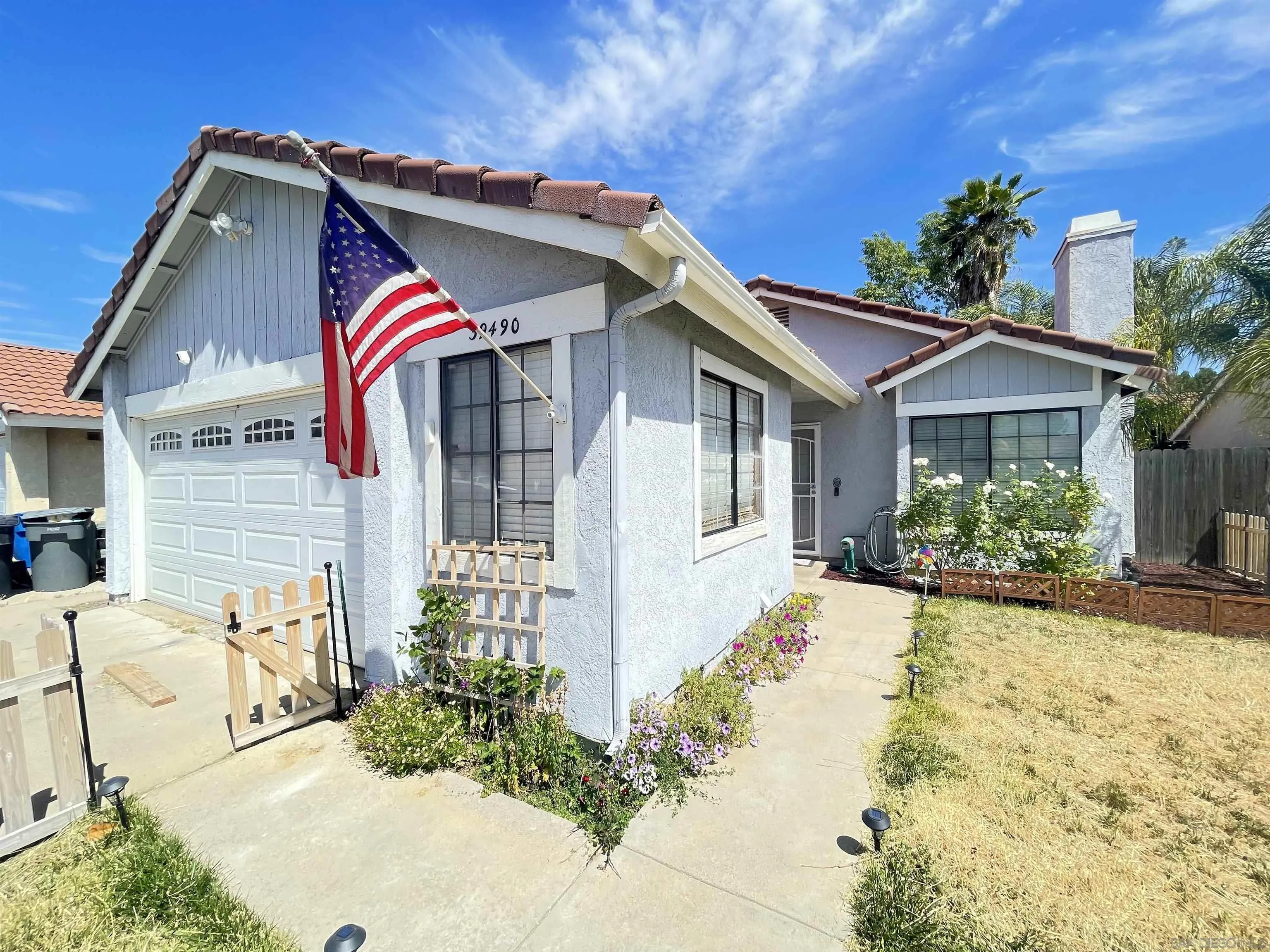 39490 Long Ridge Drive Temecula, CA 92591 - Photo 2 of 18 a view of a house with a yard