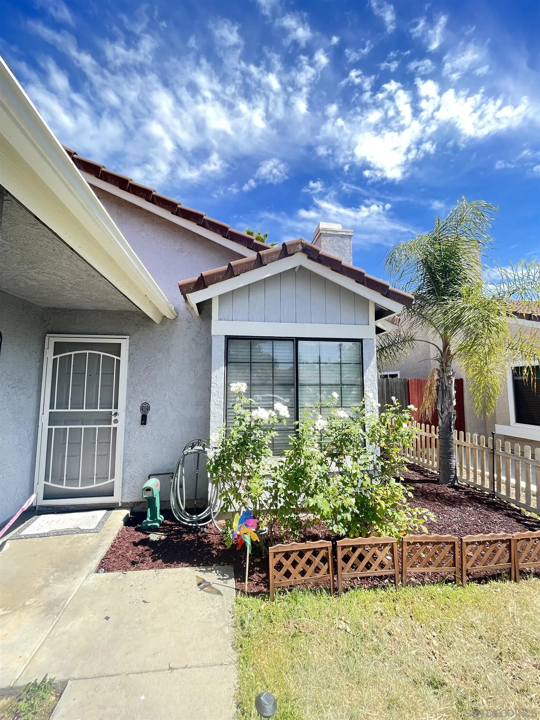 39490 Long Ridge Drive Temecula, CA 92591 - Photo 3 of 18 front view of a house with a yard