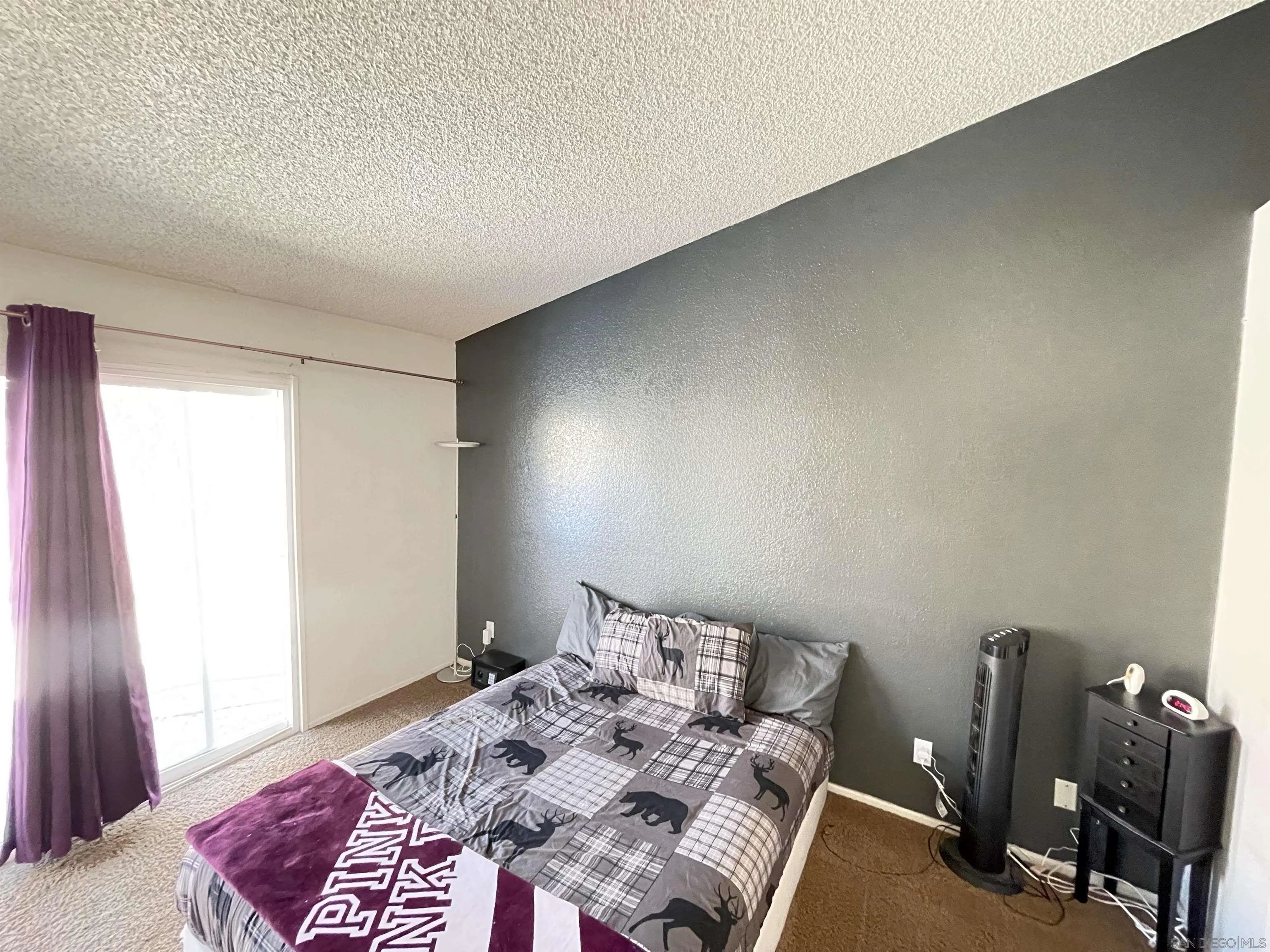 39490 Long Ridge Drive Temecula, CA 92591 - Photo 10 of 18 a bedroom with a bed a desk and chair