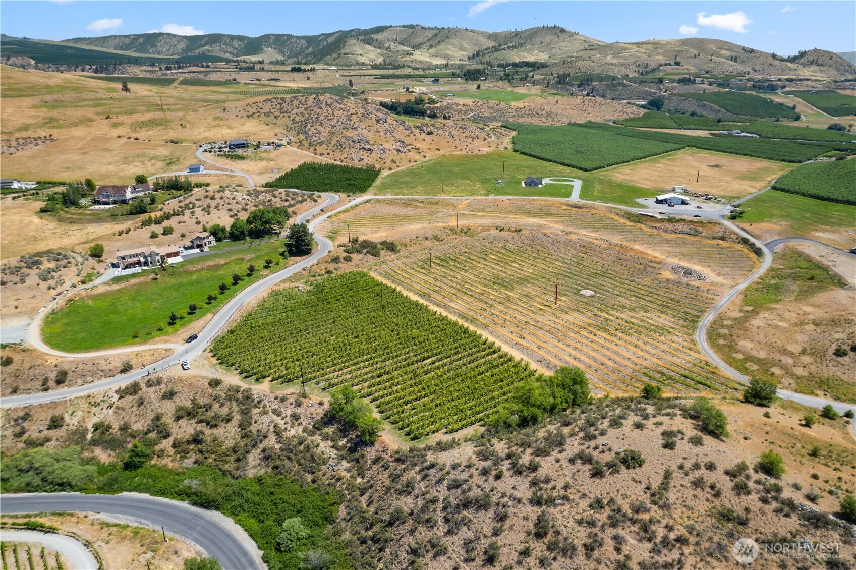 200 Lakayuse Road Manson, WA 98831 - Photo 17 of 21 a view of a lake with a mountain