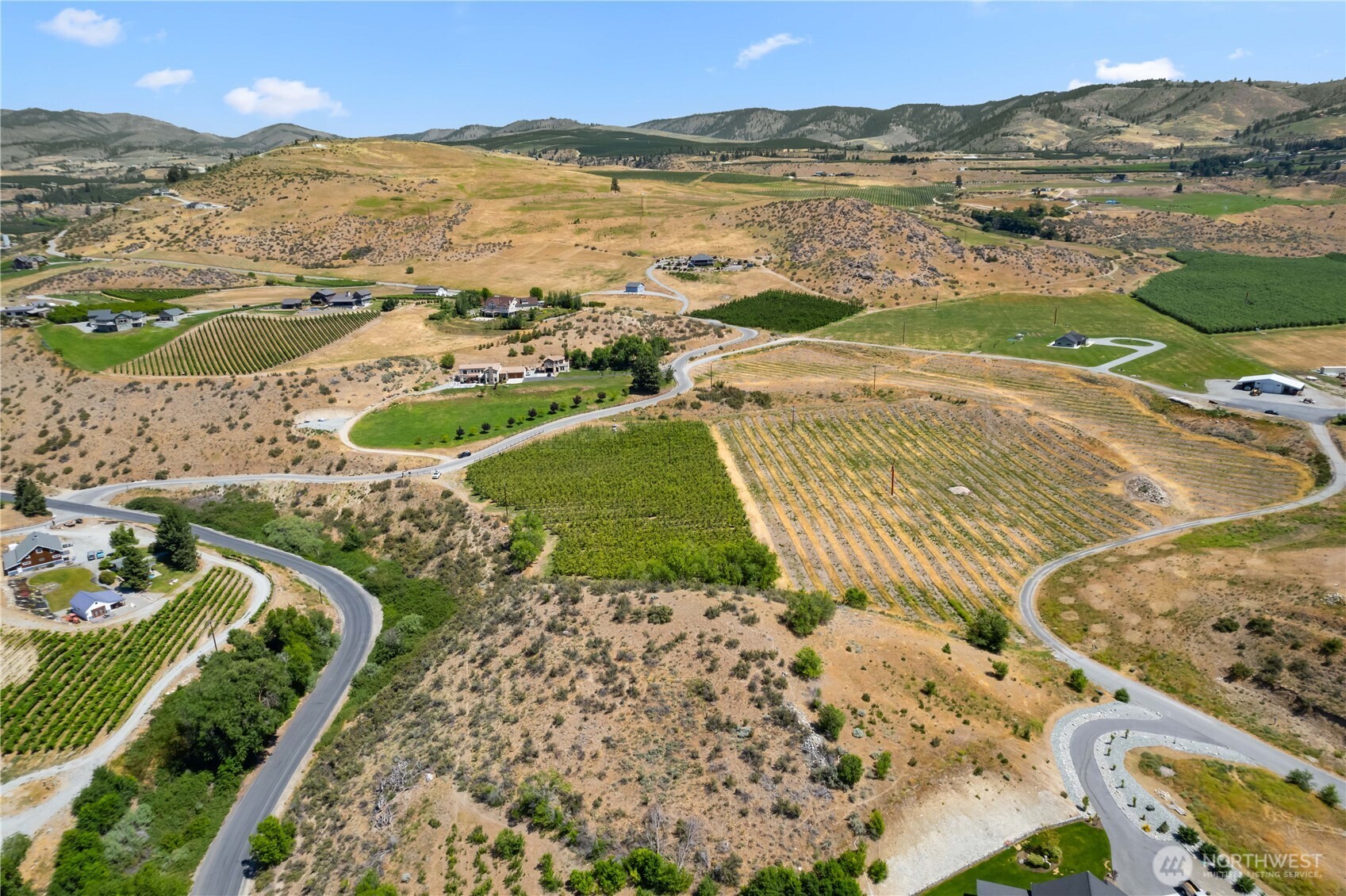 200 Lakayuse Road Manson, WA 98831 - Photo 18 of 21 a view of a city with an ocean view