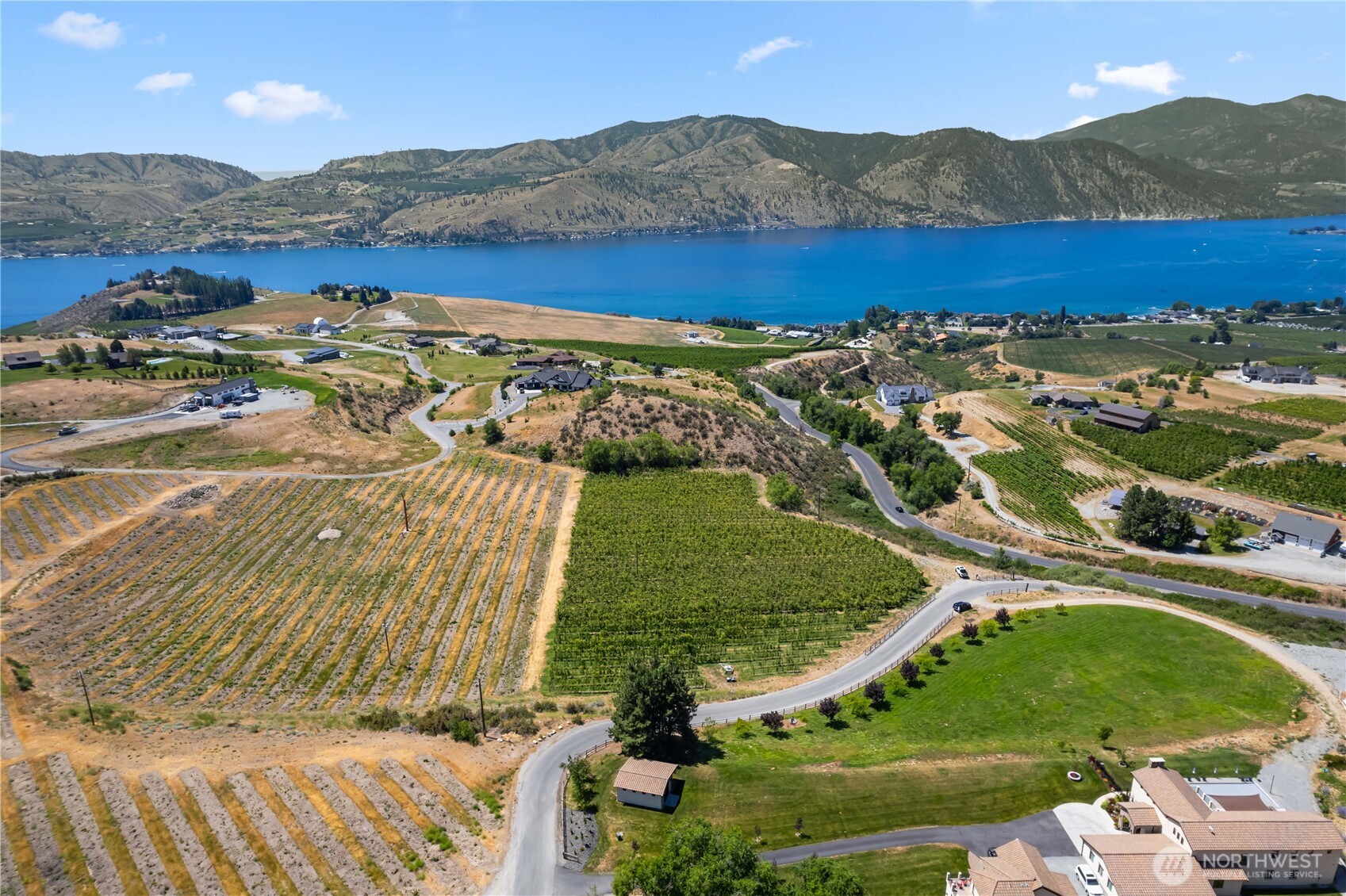 200 Lakayuse Road Manson, WA 98831 - Photo 7 of 21 an aerial view of residential houses and outdoor space