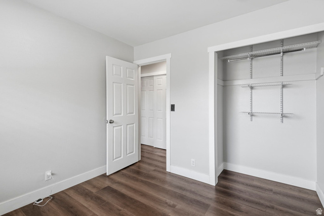 2693 Teal Way Sandy, UT 84093 - Photo 14 of 50 Room featuring wood-finish flooring, light gray wall paint, and white baseboards