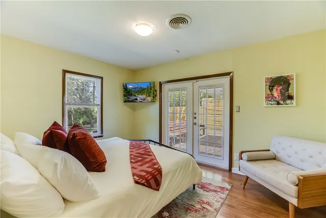 swimming pool view with a seating space