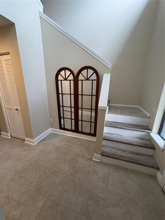9360 Craven Road, Unit 1104 Jacksonville, FL 32257 - Photo 11 of 25 a view of front door with stairs