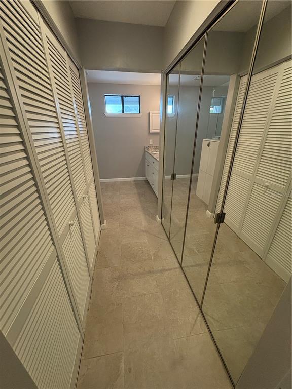 9360 Craven Road, Unit 1104 Jacksonville, FL 32257 - Photo 17 of 25 a view of a hallway