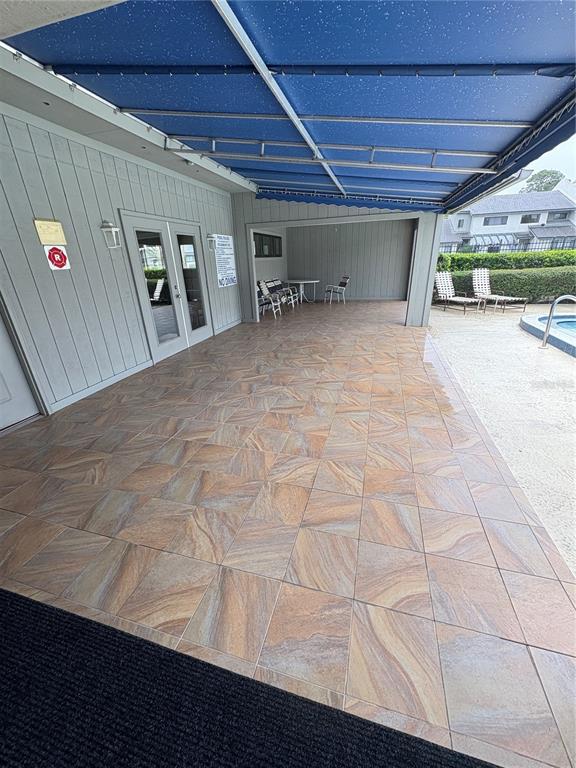 9360 Craven Road, Unit 1104 Jacksonville, FL 32257 - Photo 23 of 25 a view of a livingroom with wooden floor