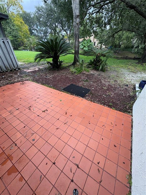 9360 Craven Road, Unit 1104 Jacksonville, FL 32257 - Photo 24 of 25 a view of a backyard and trees