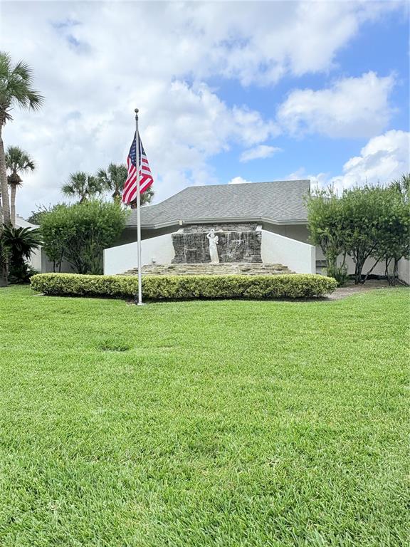 9360 Craven Road, Unit 1104 Jacksonville, FL 32257 - Photo 3 of 25 a view of a bench in front of a house