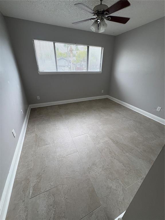 9360 Craven Road, Unit 1104 Jacksonville, FL 32257 - Photo 5 of 25 an empty room with a window