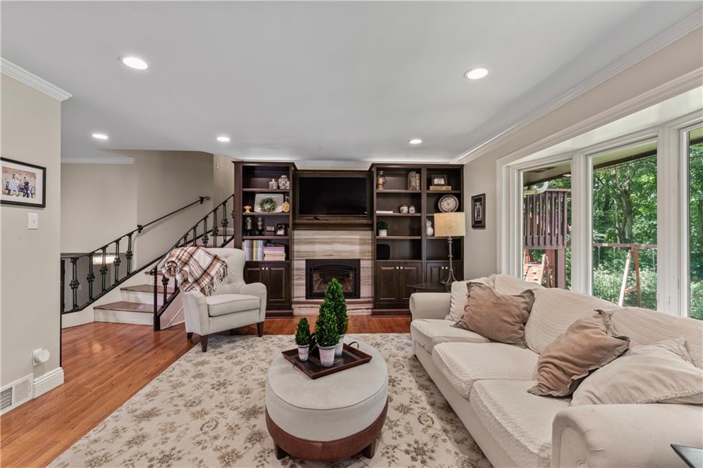 102 Forest Drive Beaver, PA 15009 - Photo 12 of 32 a living room with fireplace furniture and a large window