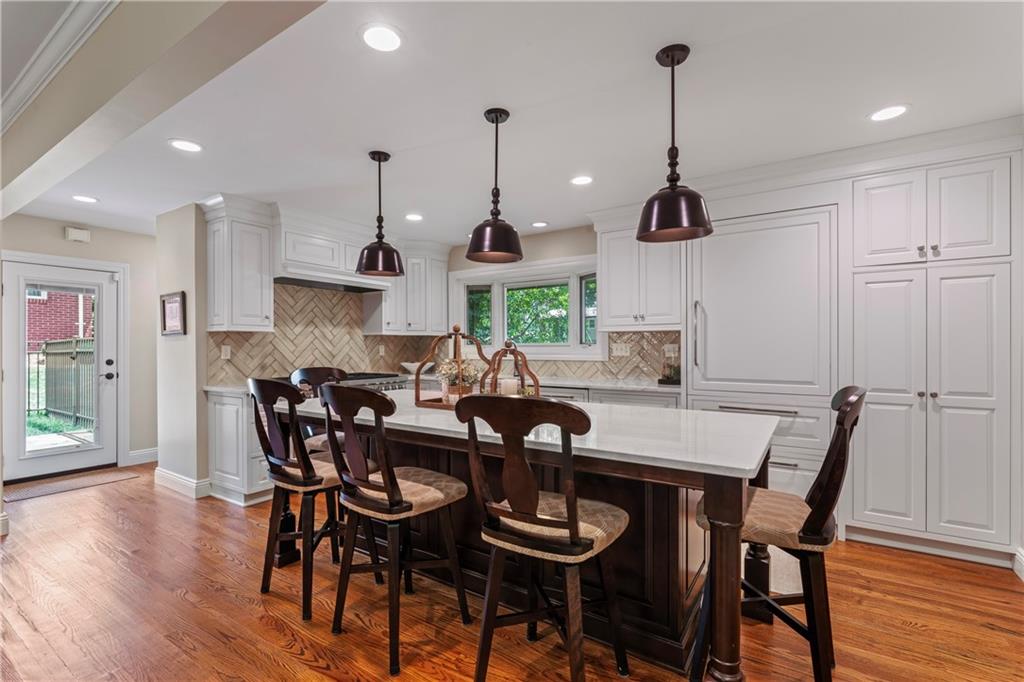 102 Forest Drive Beaver, PA 15009 - Photo 15 of 32 a view of a dining room with furniture and wooden floor