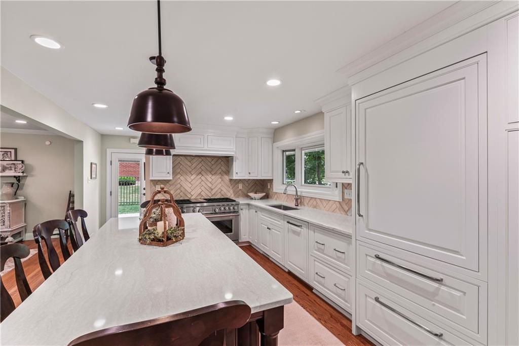 102 Forest Drive Beaver, PA 15009 - Photo 17 of 32 a kitchen with a stove a refrigerator and cabinets