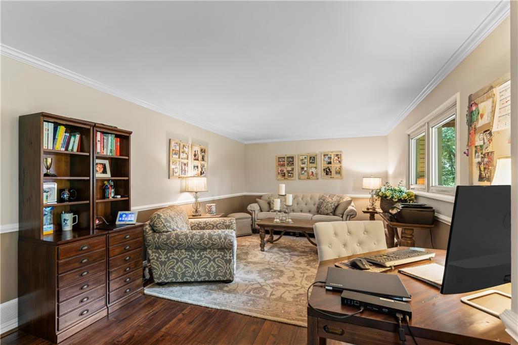 102 Forest Drive Beaver, PA 15009 - Photo 28 of 32 a living room with furniture and a bookshelf
