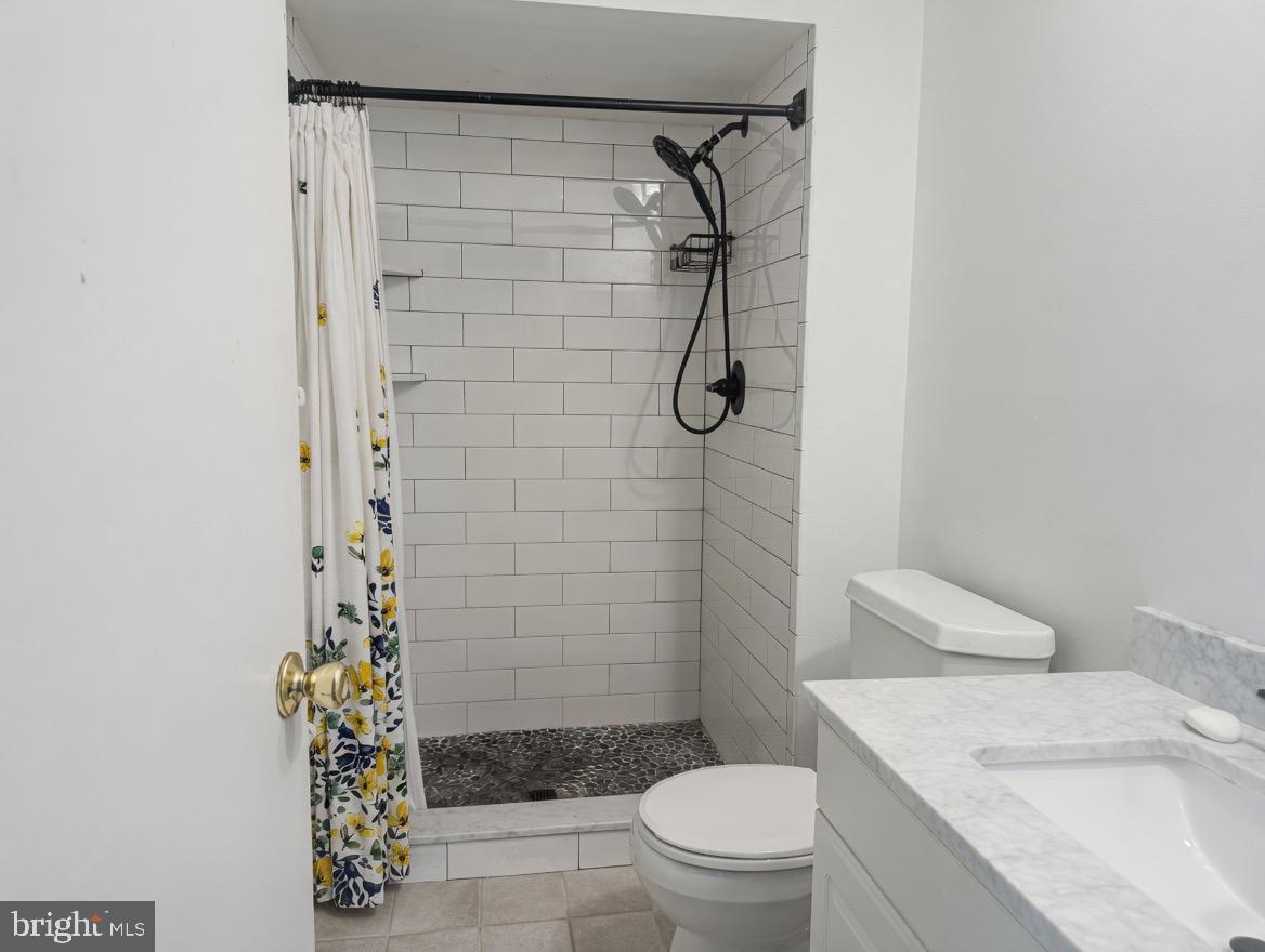 2 Goshawk Court Voorhees, NJ 08043 - Photo 21 of 33 a bathroom with a granite countertop sink toilet and shower