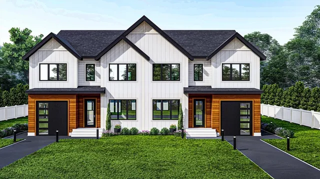 front view of a house with a yard