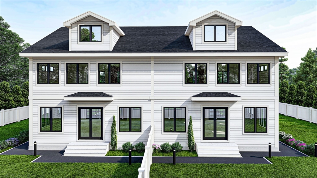 445 Hillside Avenue Needham, MA 02494 - Photo 4 of 10 a front view of a house with a yard and trees