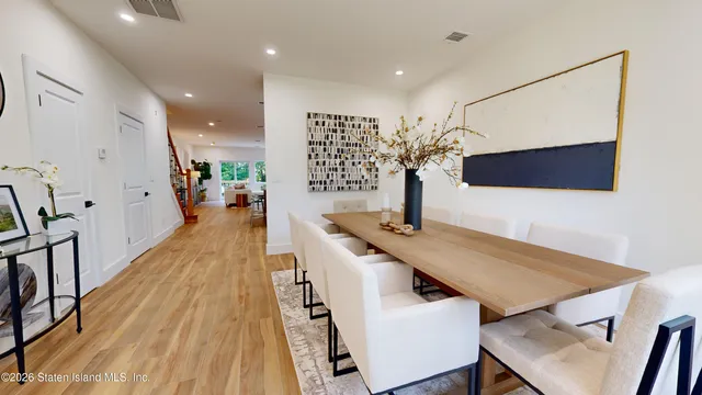 a view of a living room and dining room