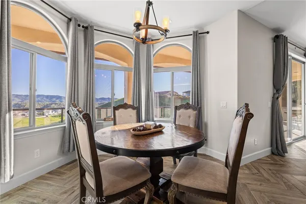 an empty room with closet and a ceiling fan