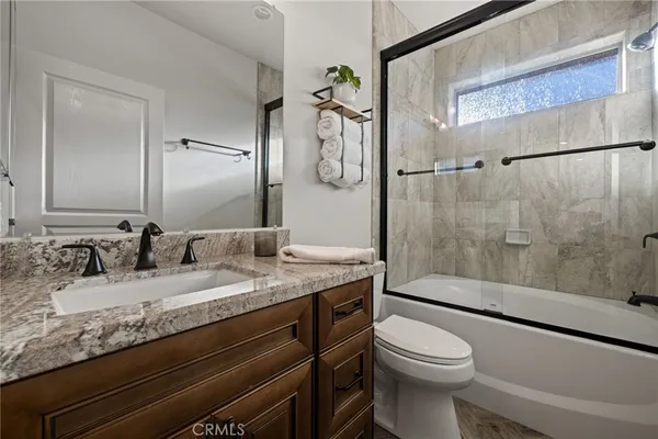 a view of a storage & utility room with wooden floor