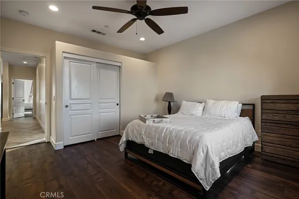 a view of living room filled with furniture and furniture