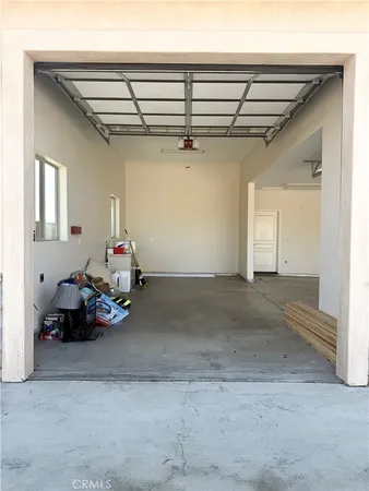 an aerial view of residential house with an outdoor space