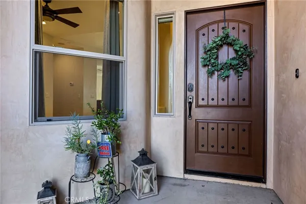 a view of livingroom with hallway and wooden floor