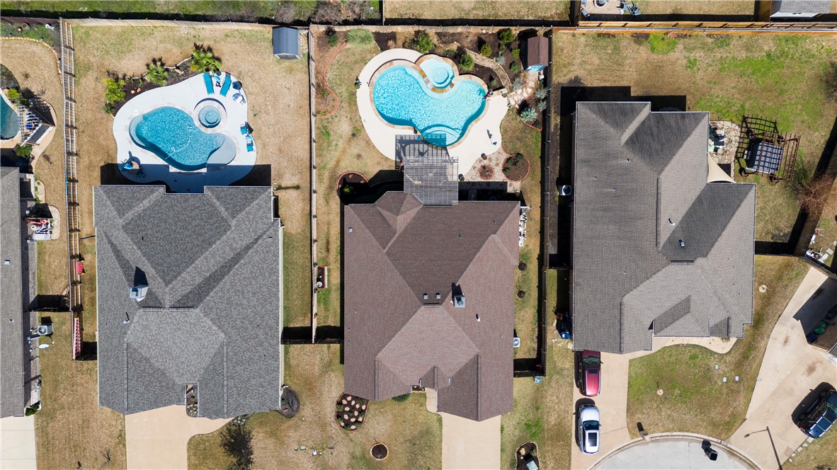 aerial view of a house with garden