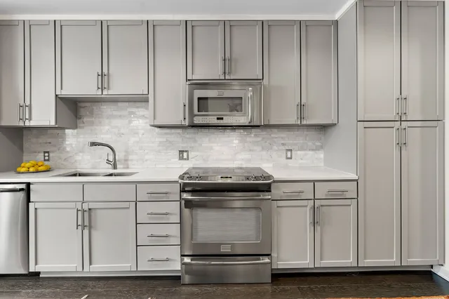 a work room with furniture and wooden floor